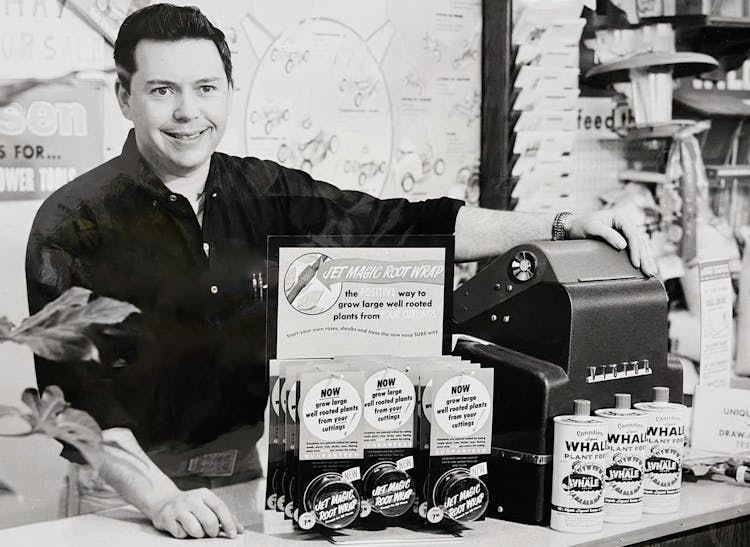 The Wishing Well's founder, Regis Raujol, works the cash register in a vintage promotional photo from the 1960s